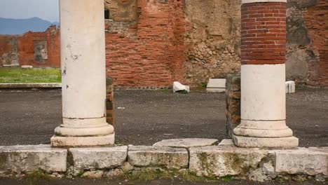 ruins of famous pompeii city, italy.building of eumachia