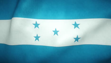 la bandera de honduras ondeando en el viento