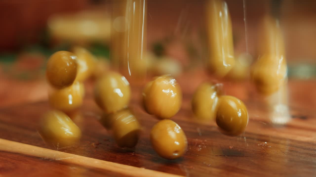 Green Olives on Wooden Cutting Board