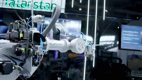 rusrobot industrial robotic arm displayed at a technology exhibition
