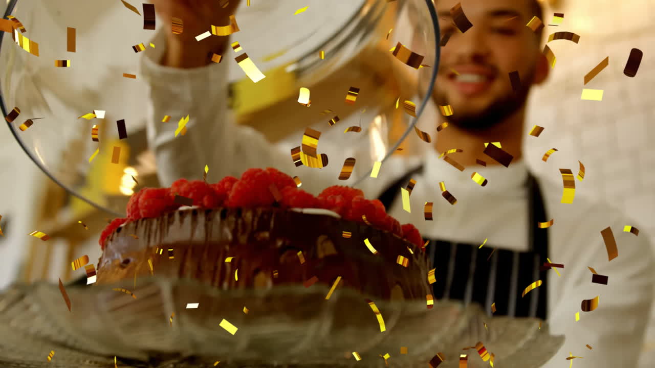 Confetti animation over chef placing raspberries on chocolate cake