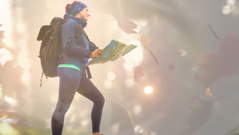 hiker with backpack holding map