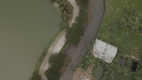 birdseye view of river side of the suburban of jakarta