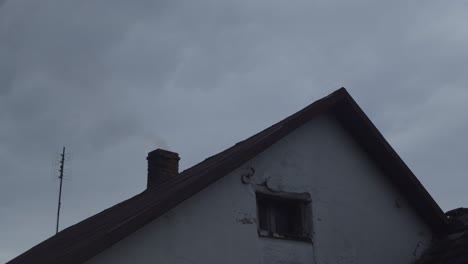 chimney smoke old cottage house at the farm