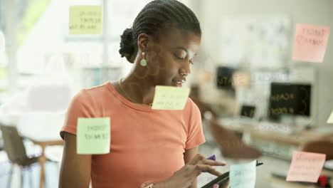 woman brainstorming in a modern office