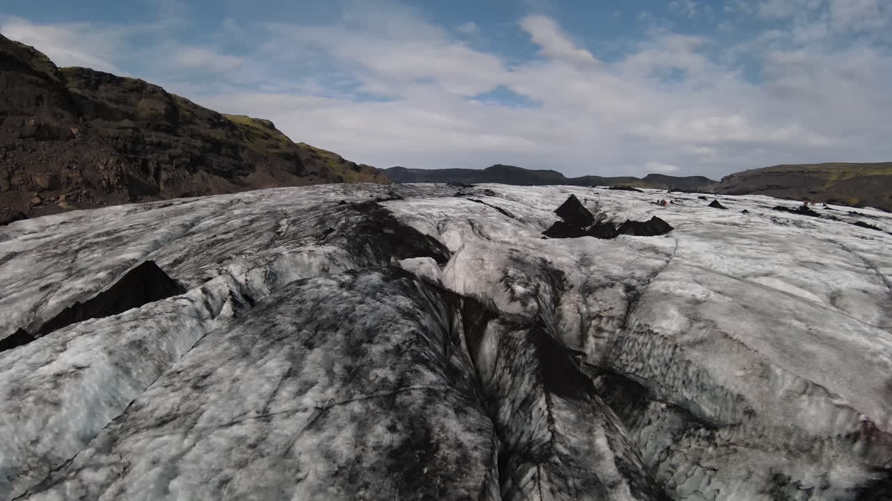 Glacier Landscape in Iceland with Hikers