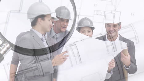 suited men and women with building plans montage over architectural drawing and magnifying glass