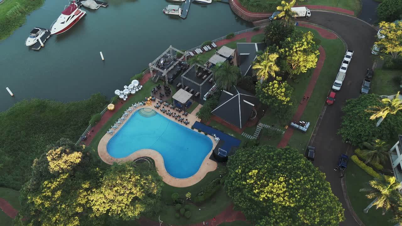 Aerial view of a hotel pool area decorated for a party in Misiones, Argentina