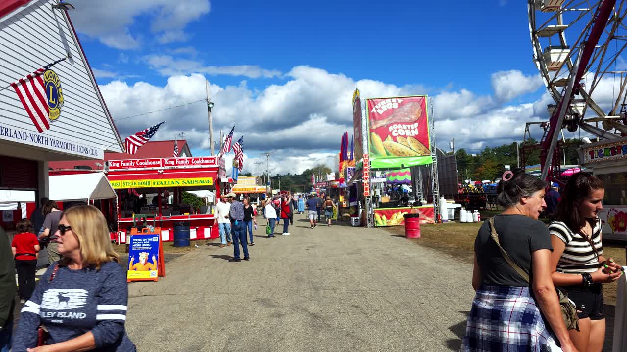 Walking down the midway at the Cumberland Fair near Portland, Maine