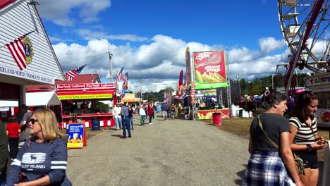 walking down the midway at the cumberland fair near portland, maine