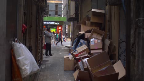 man on the phone in an alley