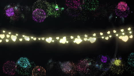 cadena brillante de luces de hadas con fuegos artificiales