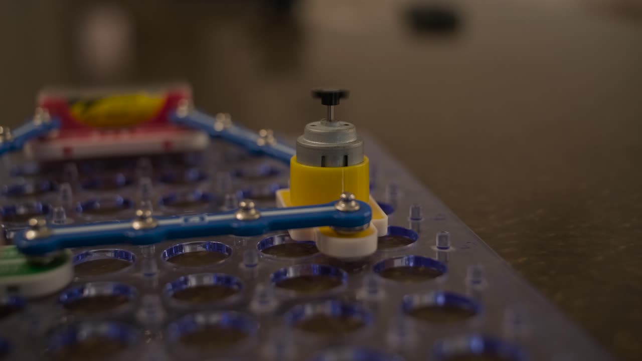 Small Electric Motor Spinning on a Snap Circuits Board