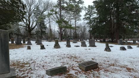 Drone-Fly-through-Old-Cemetery-and-tree-in-winter-snow-near-Murfreesboro-Tennessee