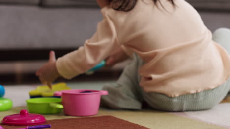 asian baby in living room