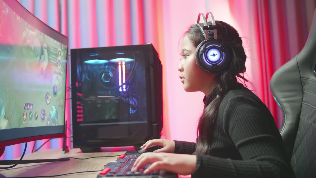 Young Girl Gaming on Computer