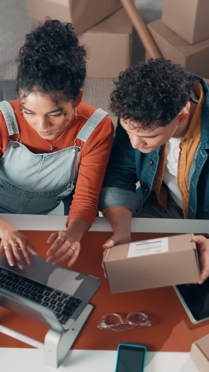 Young Entrepreneurs Collaborating on Online Business Orders