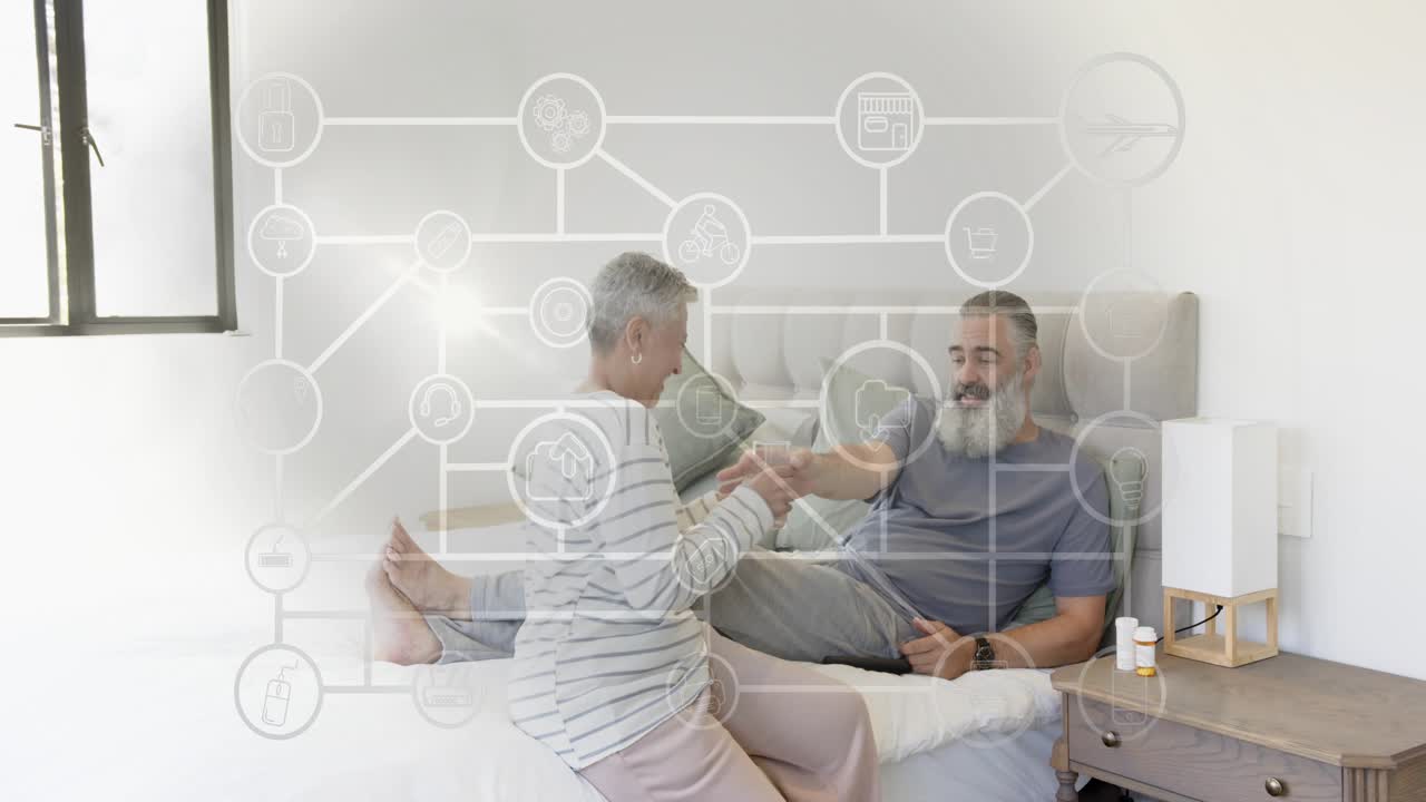 Man lying on bed with phone, woman entering offering meds while network icons growing for care