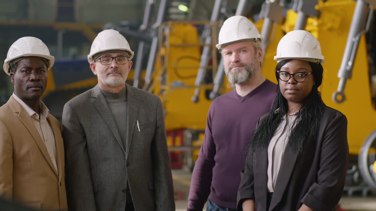 Group Portrait of Multiethnic Factory Engineers