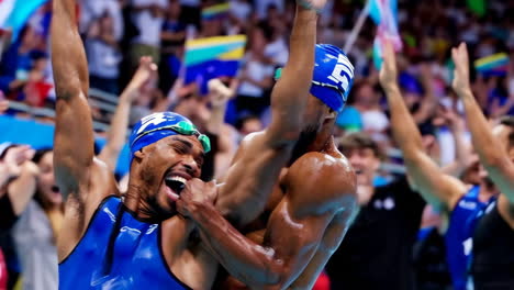 swimmers celebrating victory