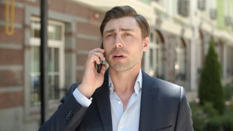 portrait of man talking on phone about work