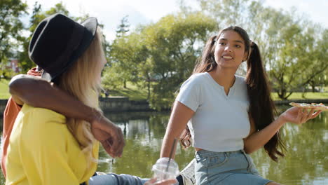 young people having a good time near the river