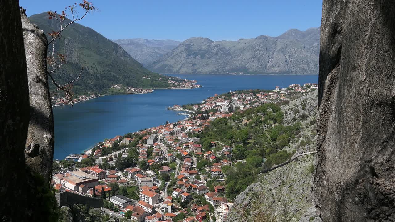 Kotor Bay, town, mountains and sea, forward crane shot, Montenegro