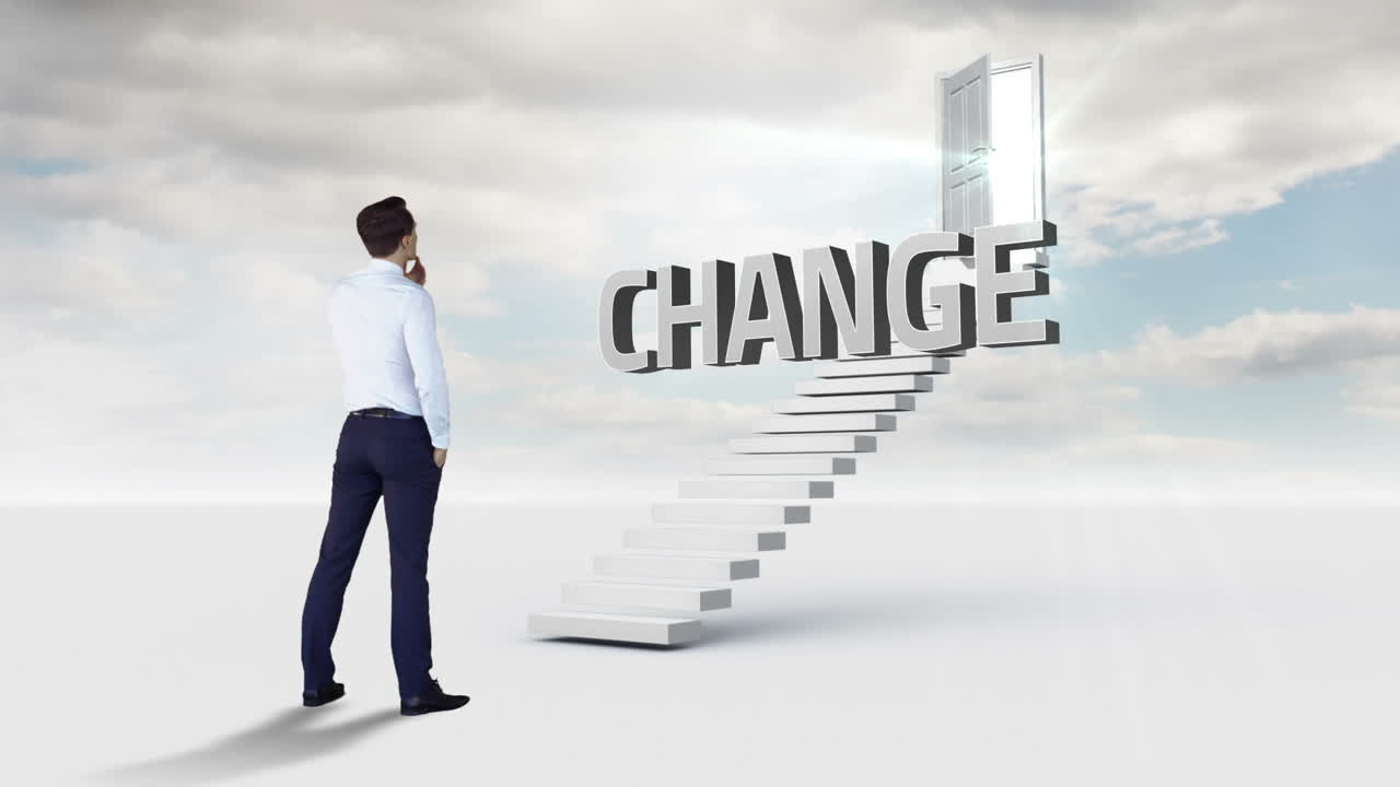 Businessmam looking at a word put on a stair 