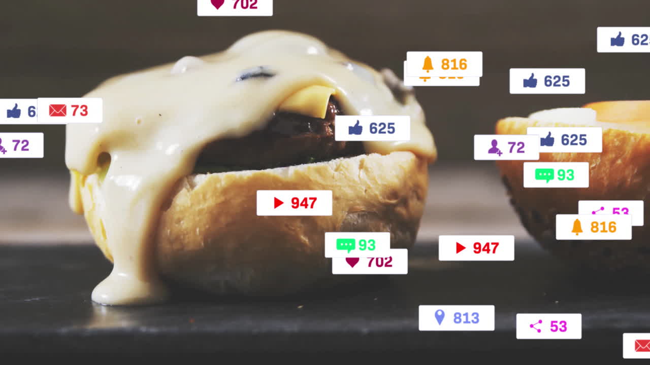 Burger with melted cheese and animation of social media icons floating