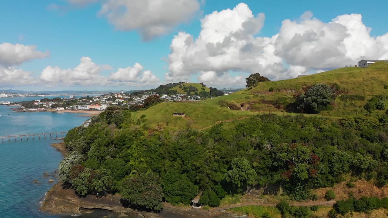 SLOWMO - Flying over North Head guns with Mount Victoria and Devonport in background, Auckland, New Zealand
