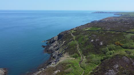 amlwch anglesey island north wales rugged mountain coastal walk aerial view orbit right