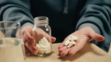 woman taking pills