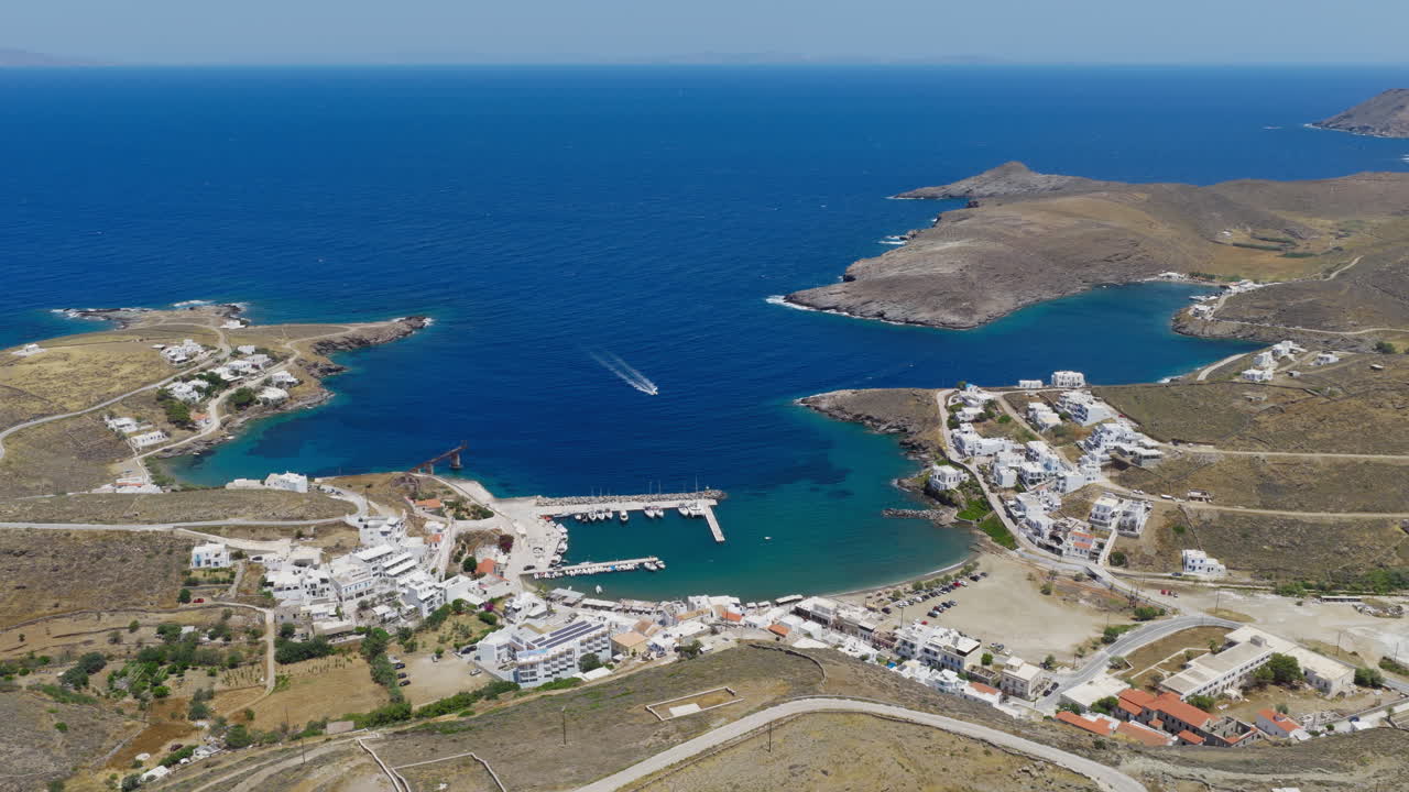 Loutra seaside village and a port in Kythnos island, Cyclades, Aegean sea, Drone shot, Panoramic view