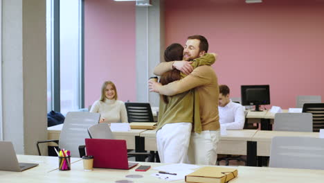 coworkers talking in the office