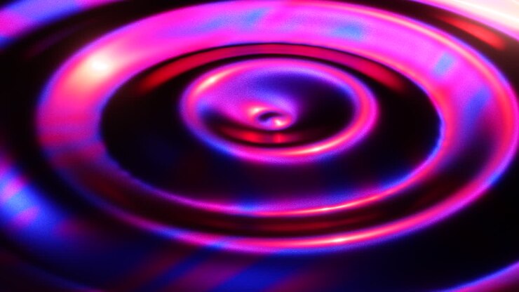 Close-up de água com luzes vermelhas e azuis. Animação em loop infinito.