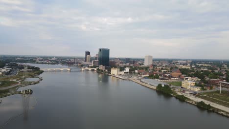 downtown toledo, ohio on the maumee river, aerial fly toward view