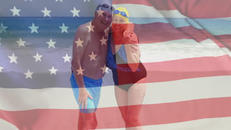 animation of flag of usa over caucasian senior couple on beach in summer