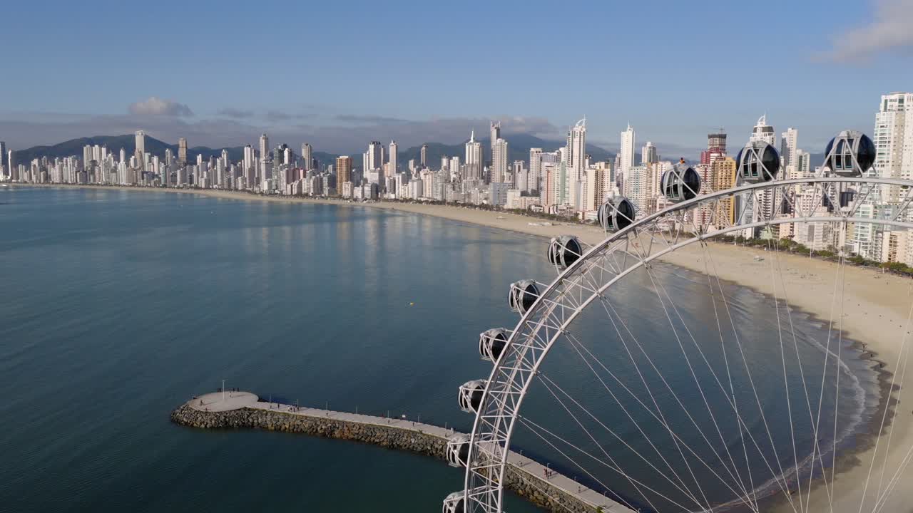 Aerial View of Ferris Wheel and modern Skyline at Luxury Balneario Camboriu Beach, Brazil