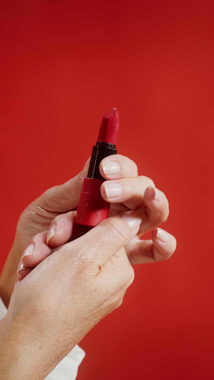 Red Lipstick in Hands