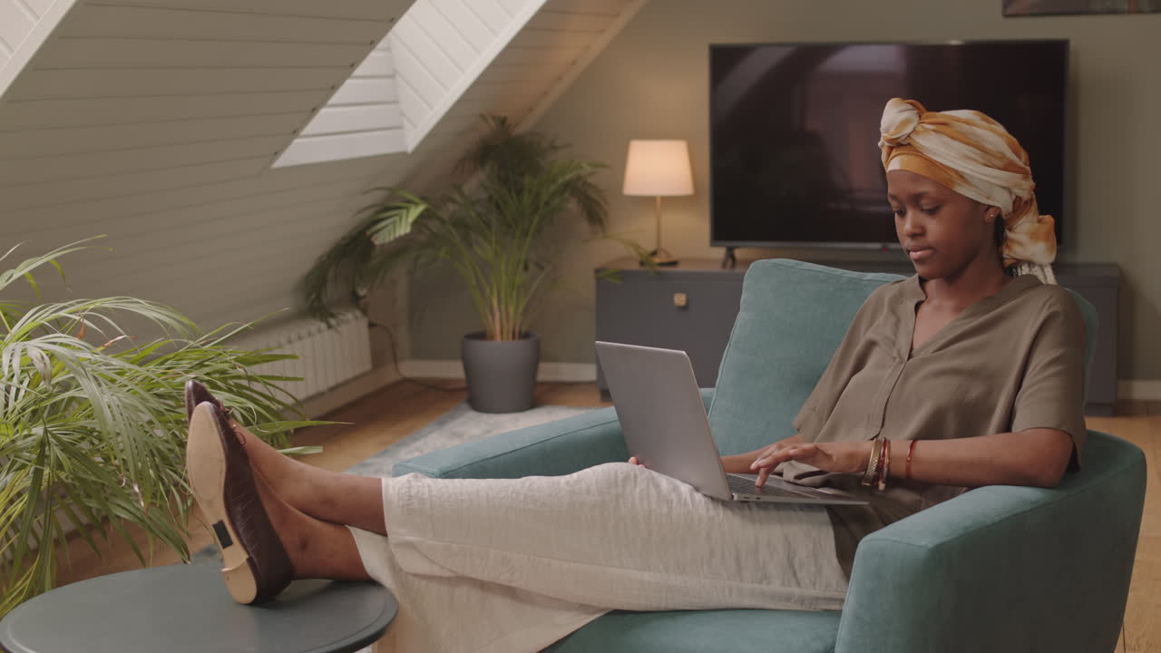 African American Woman Working on Laptop