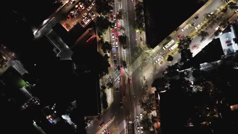 drone perspective of mexico city’s avenues and vehicles during the night