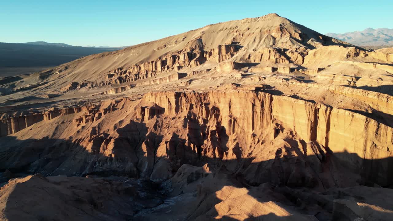 Wide overhead drone shot capturing the otherworldly terrain of Valle de la Luna, a natural wonder in northern Chile’s Atacama Desert