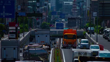 a timelapse of the traffic jam at the urban street in tokyo long shot