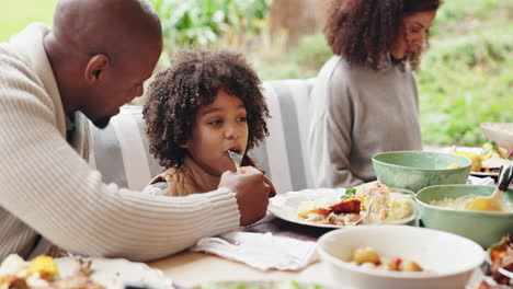 family enjoying dinner together