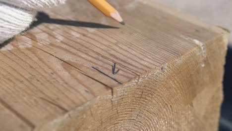 marking wood with pencil