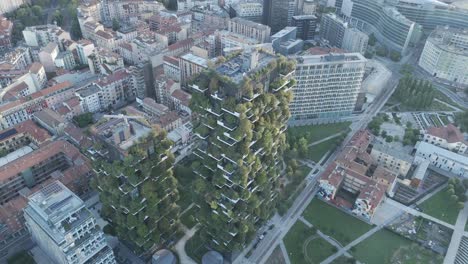 stunning drone footage of bosco verticale's green towers.