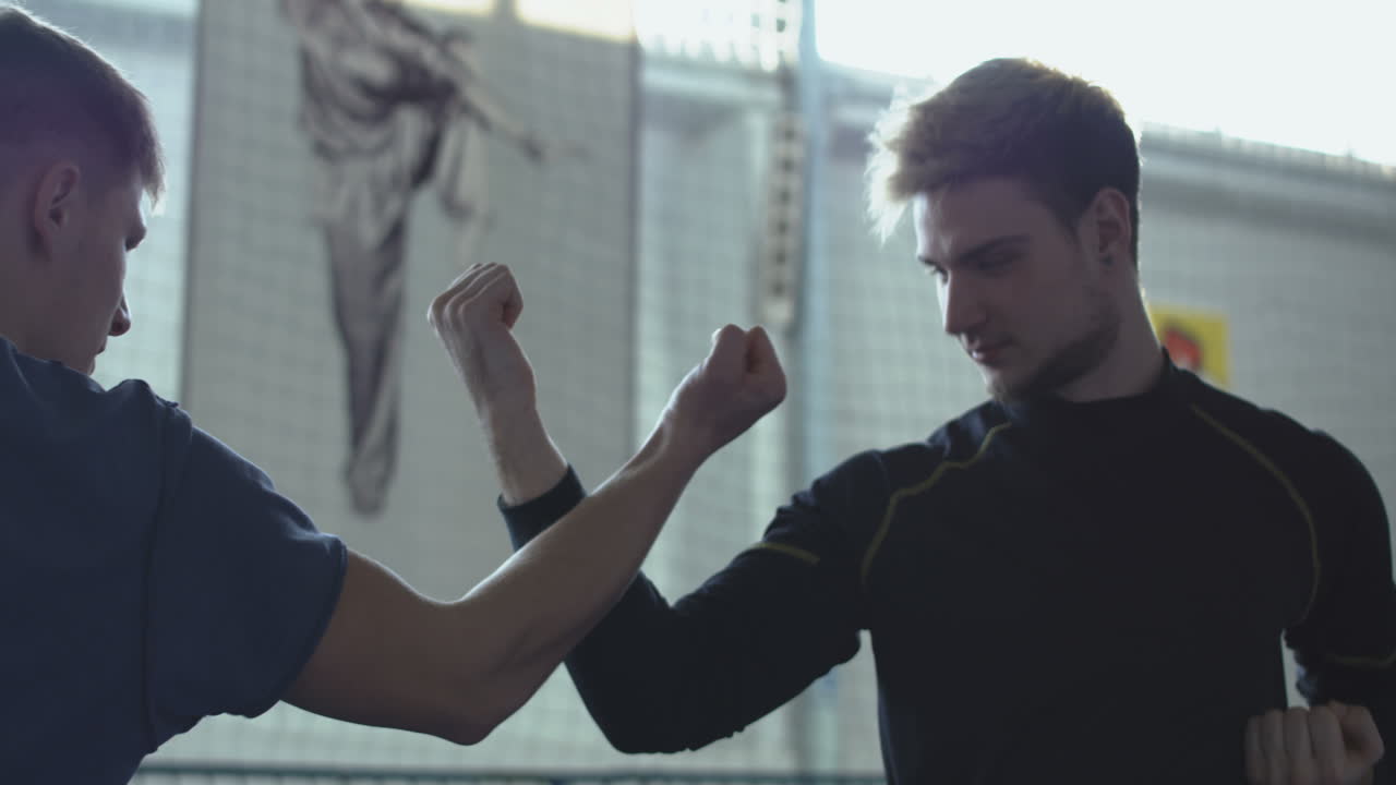 Two Men Training in Martial Arts