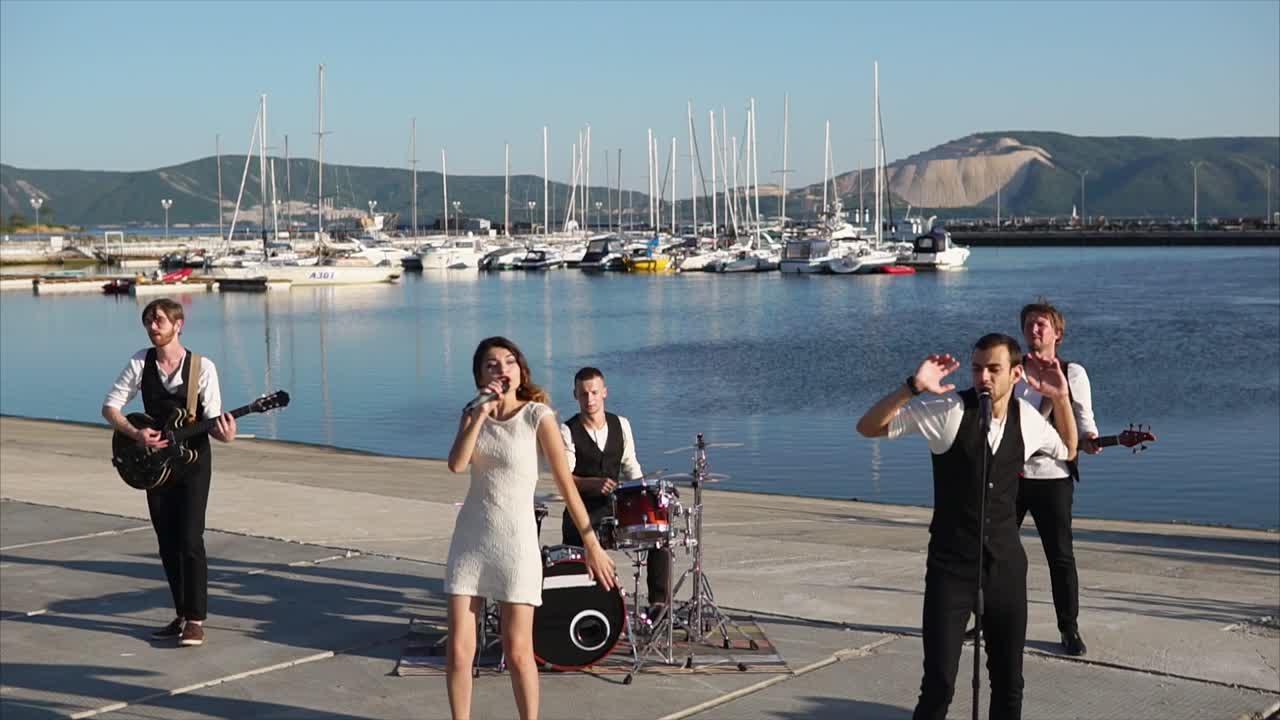 Band Performing Live at a Marina