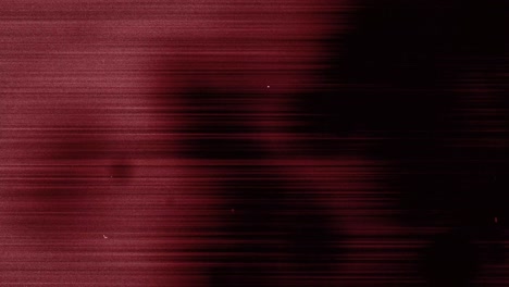 Animation-of-multiple-white-specks-and-lines-moving-on-seamless-loop-in-black-and-red