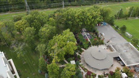 aerial view of pavilion with outdoor wedding happening in the garden